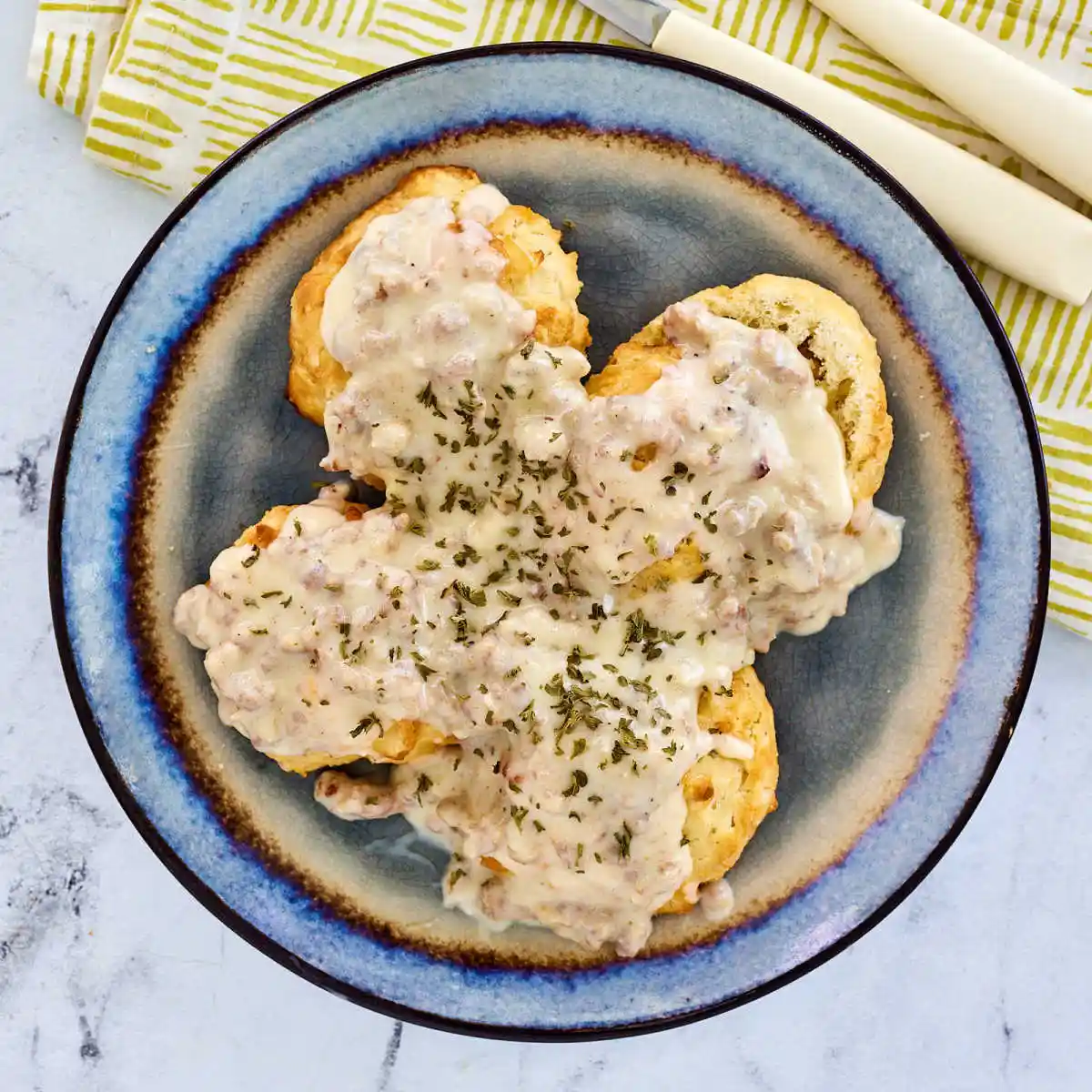 Ultimate Homemade Biscuits and Gravy Recipe 2 A comforting plate of freshly baked buttermilk biscuits topped with rich and creamy turkey sausage gravy